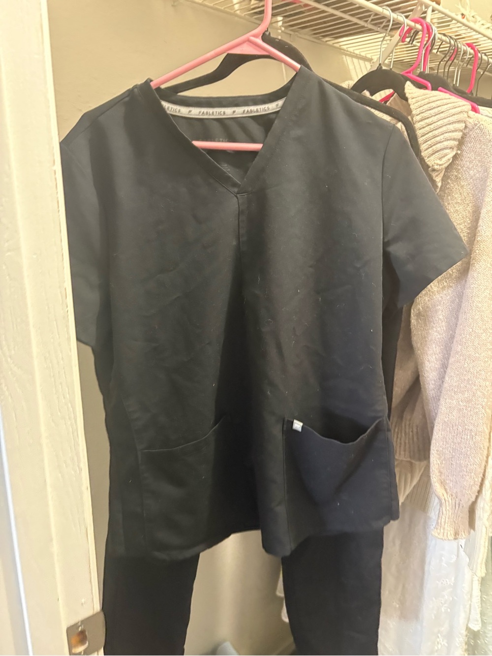 Black Medical Scrubs Top with black scrub bottoms and  Pockets